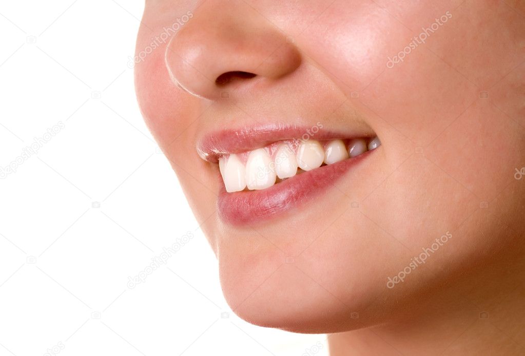 Smiling young girl mouth