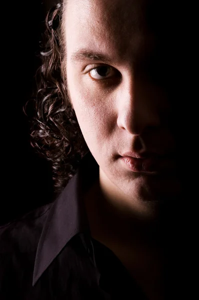 Young man dramatic light portrait — Stock Photo, Image