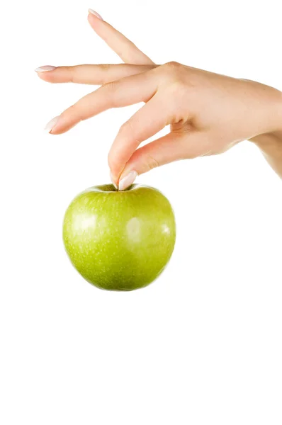 Ženská ruka drží jablko — Stock fotografie