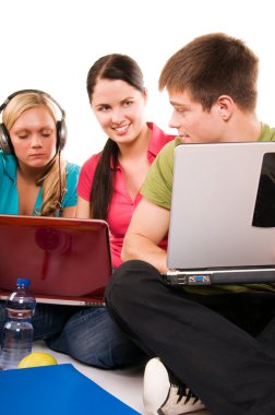 Group of students doing home work clipart