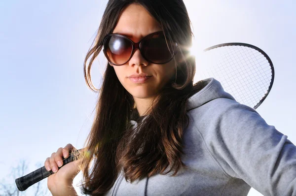 Young woman with badminton racquet — Stock Photo, Image