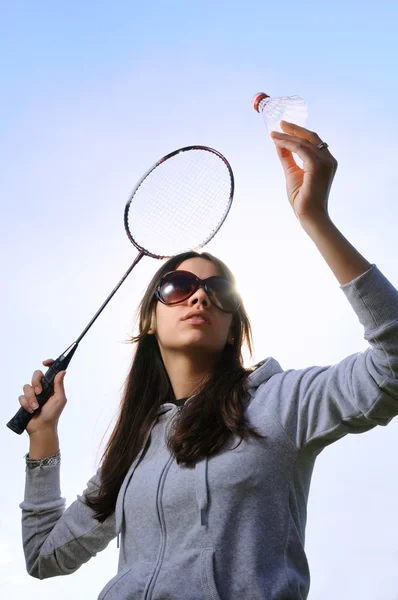Young woman with badminton racquet — Stock Photo, Image