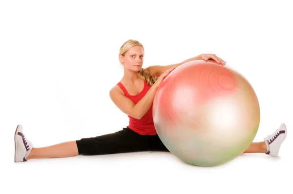 Woman exercising with a pilates ball — Stock Photo, Image