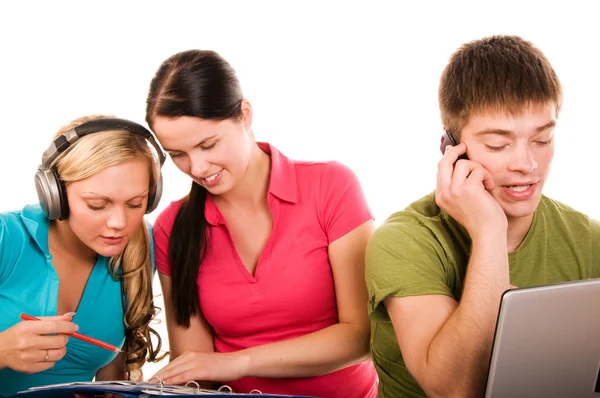 Group of students doing home work — Stockfoto