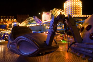 Amusement park at night clipart