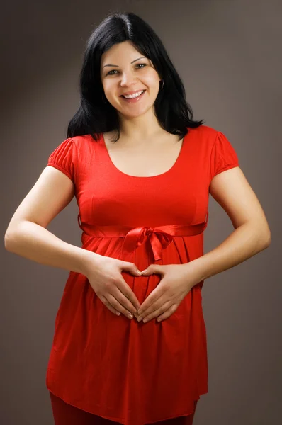 Χαρούμενη όμορφη έγκυος γυναίκα — Φωτογραφία Αρχείου