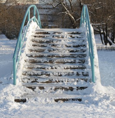 Bridge over pond at winter clipart