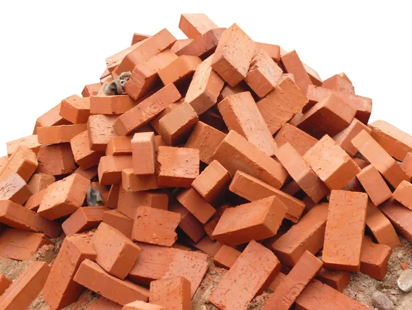 Heap of red brick isolated — Stock Photo, Image