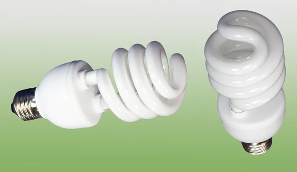 Zwei Leuchtstoffröhrenlampen auf grün — Stockfoto