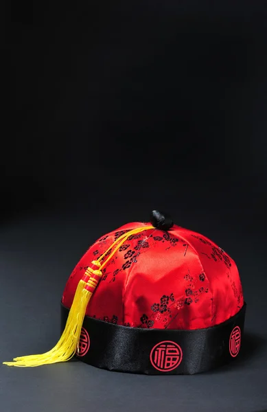 stock image Red Chinese silk hat.