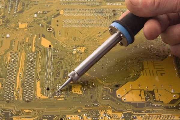 Soldering a circuit board — Stock Photo, Image