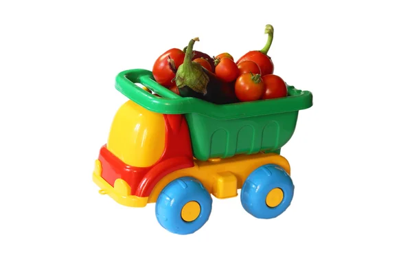 Toy truck with vegetables — Stock Photo, Image