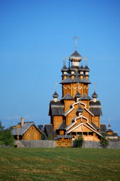 Wooden church in a village — Stock Photo, Image