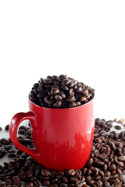 Taza con granos de café —  Fotos de Stock