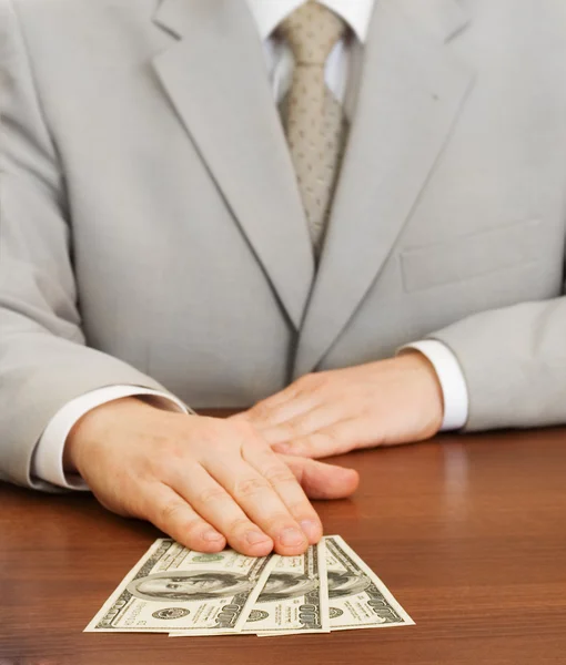 stock image Businessman wearing suit with hands clas