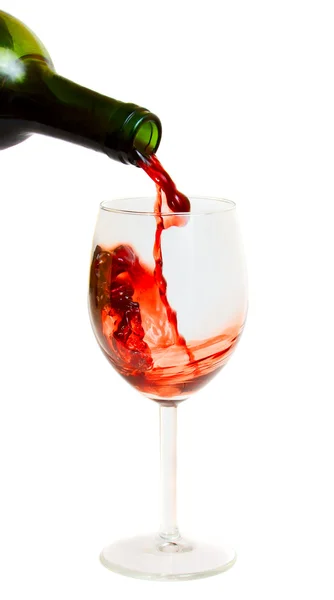 Vinho tinto, derramado em um copo — Fotografia de Stock