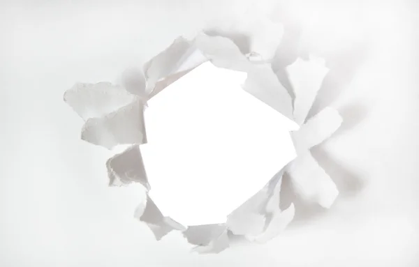 Hole on white paper — Stock Photo, Image