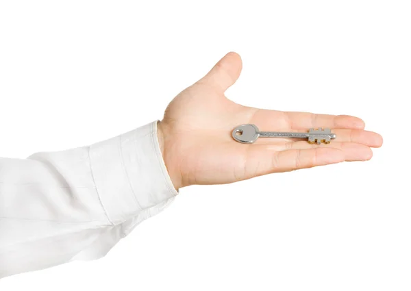 Businessman hand, holding key isolated — Stock Photo, Image