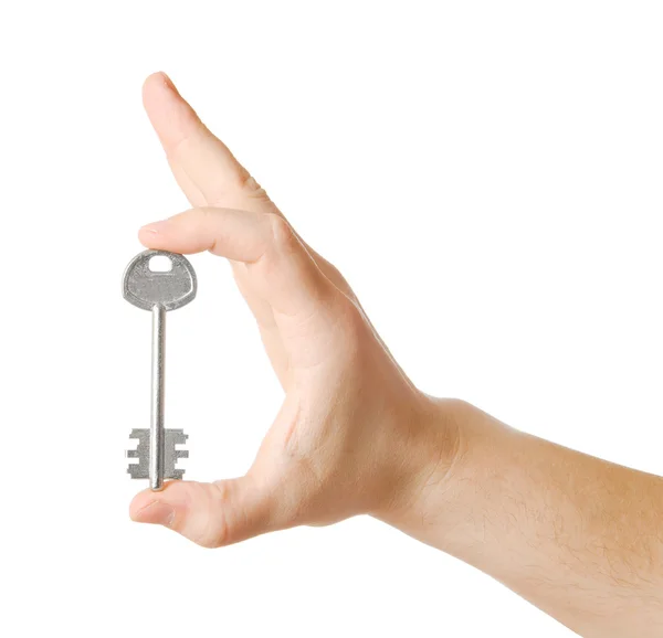 Male hand with key isolated — Stock Photo, Image