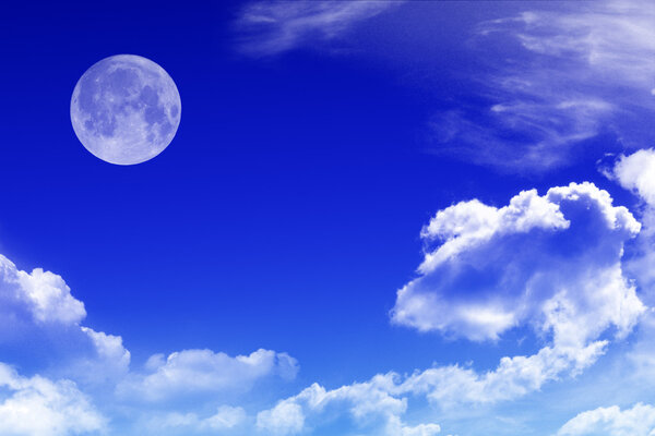 Blue sky with clouds and moon