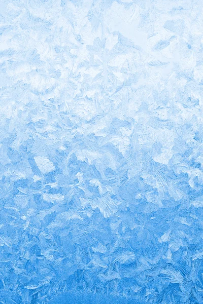 Licht blauw bevroren vensterglas Stockafbeelding