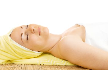 Young woman getting the spa treatment clipart