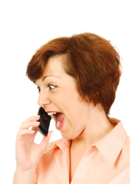 Кричащая девушка с мобильным телефоном — стоковое фото