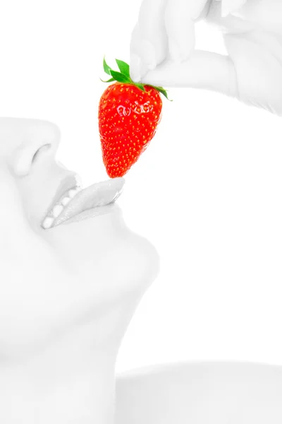 Young girl eat strawberry isolated on wh — Stock Photo, Image