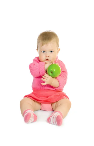 Маленька дитина з зеленим яблуком ізольована — стокове фото