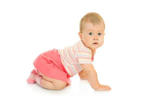 Pequeno bebê rastejando em vestido vermelho — Fotografia de Stock