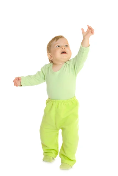 Małe dziecko w zielonej — Zdjęcie stockowe