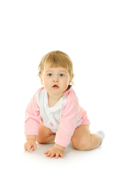 Vergadering klein meisje in roze jurk — Stockfoto