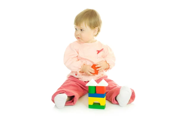 Piccolo bambino con un giocattoli isolati — Foto Stock