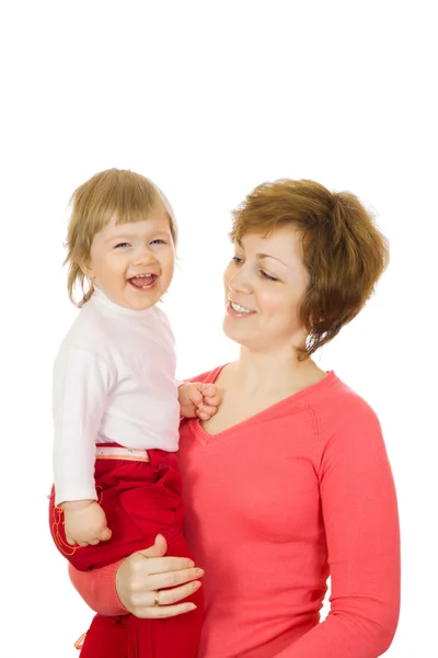 Små skrattande baby i rött med mamma jag — Stockfoto