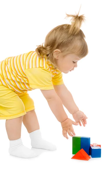 Menina com cubos de brinquedo — Fotografia de Stock