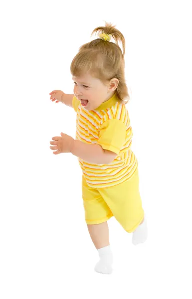 실행 중인 소녀 노란색 셔츠와 바지 — 스톡 사진