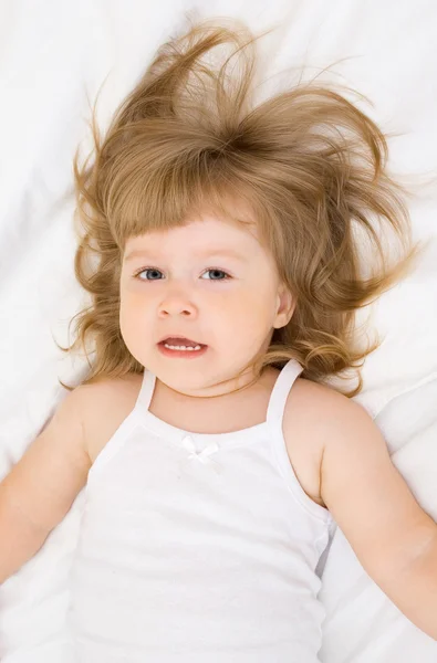 Little girl in a bed — Stock Photo, Image