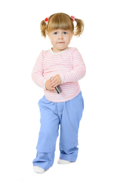 Маленькая девочка с мобильным телефоном — стоковое фото