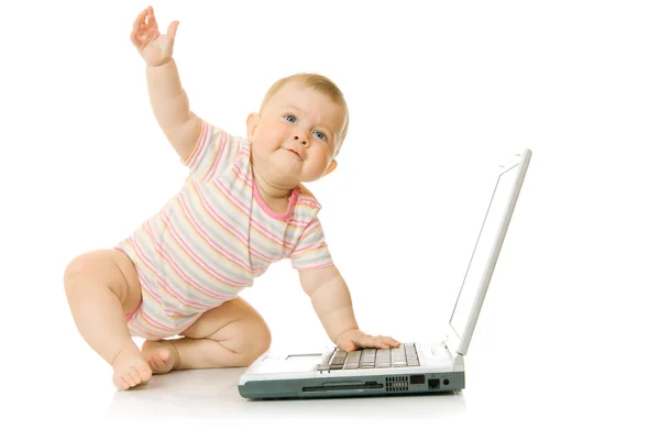 Маленький ребенок с ноутбуком # 9 изолирован на WH — стоковое фото