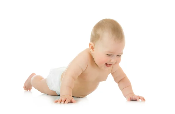 Маленький улыбающийся ребенок на полу — стоковое фото
