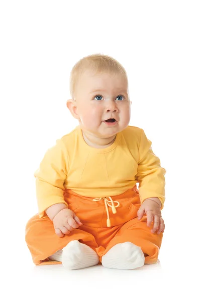 Pequeno bebê sorridente no desgaste laranja — Fotografia de Stock