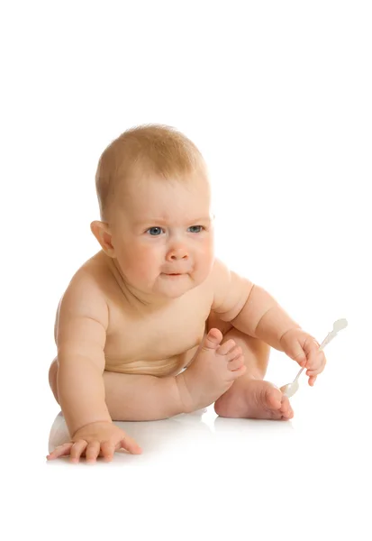 Bebê pequeno com colher — Fotografia de Stock