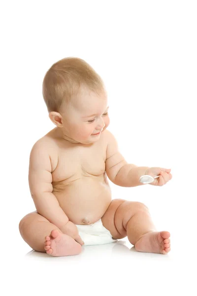 Kleine baby spelen met lepel — Stockfoto