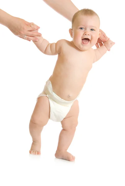 Eerste stappen van kleine baby geïsoleerd — Stockfoto
