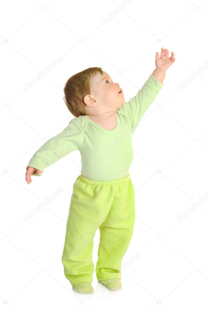 Small smiling baby in green isolated