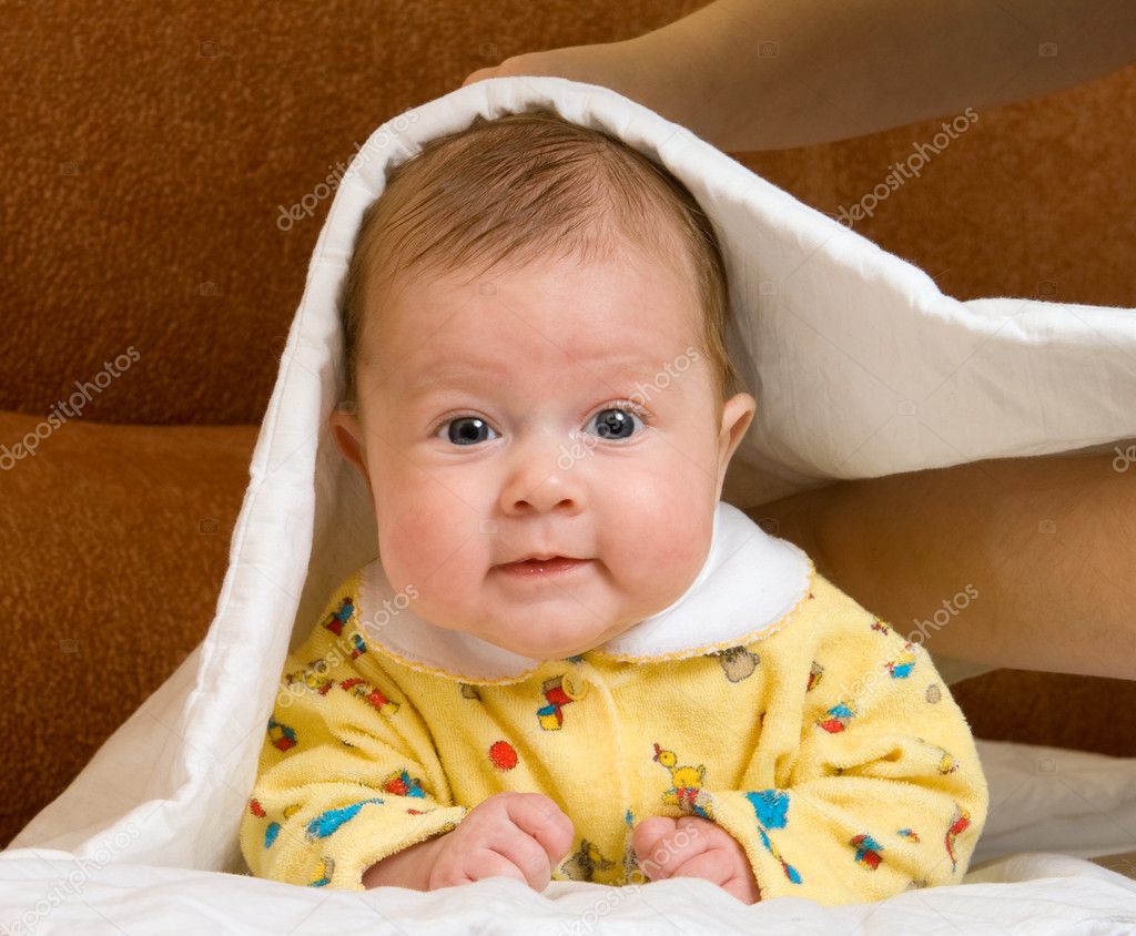 Cute Baby Sitting Between Green Blanket Stock Photo Phakimata 3126524