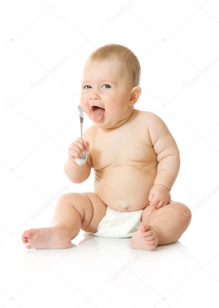 Small baby playing with spoon