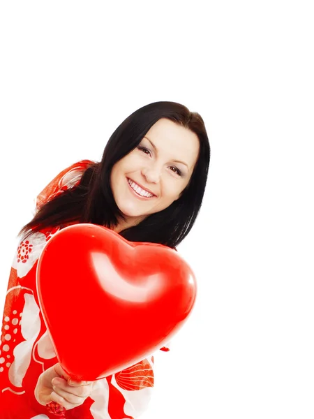 Smiling woman holding valentine heart ba — Stock Photo, Image
