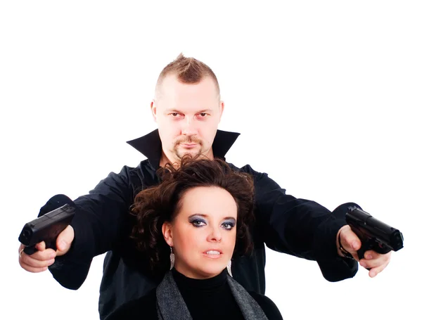 Couple holding guns over white backgroun — Stock Photo, Image