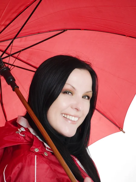 Smiling brunette woman with umbrella — Stock Photo, Image